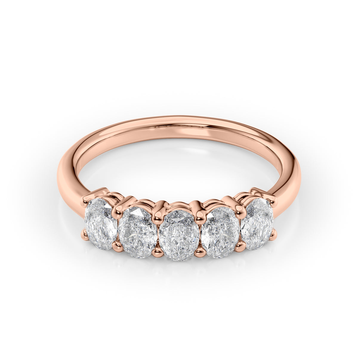 1ct Oval Anniversary. A Rose Gold Anniversary Ring Set With 1tcw Oval Lab Grown Diamonds. White Background.