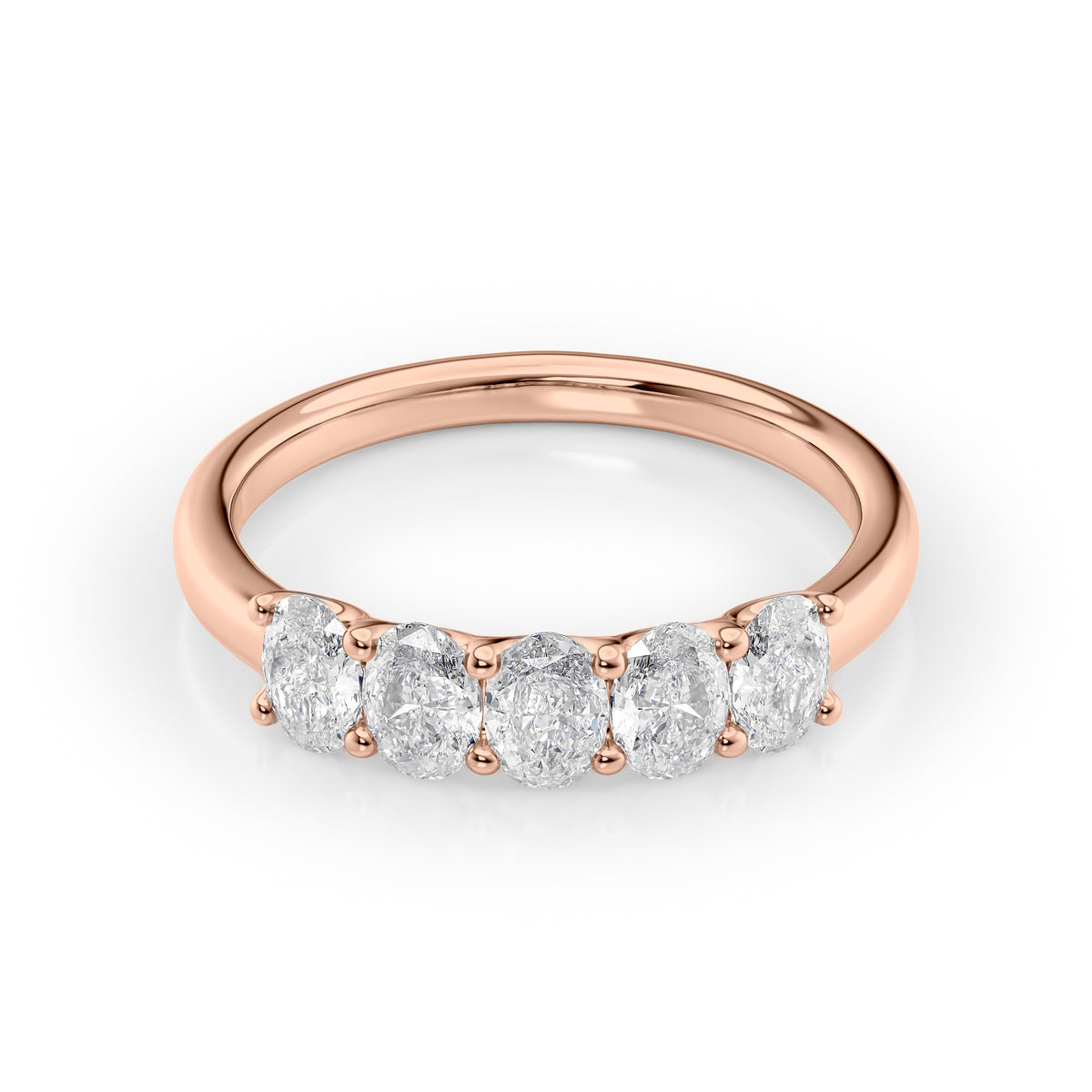 1ct Oval U Prong Anniversary. A Rose Gold Anniversary Ring Set With 1tcw Oval Lab Grown Diamonds. White Background.