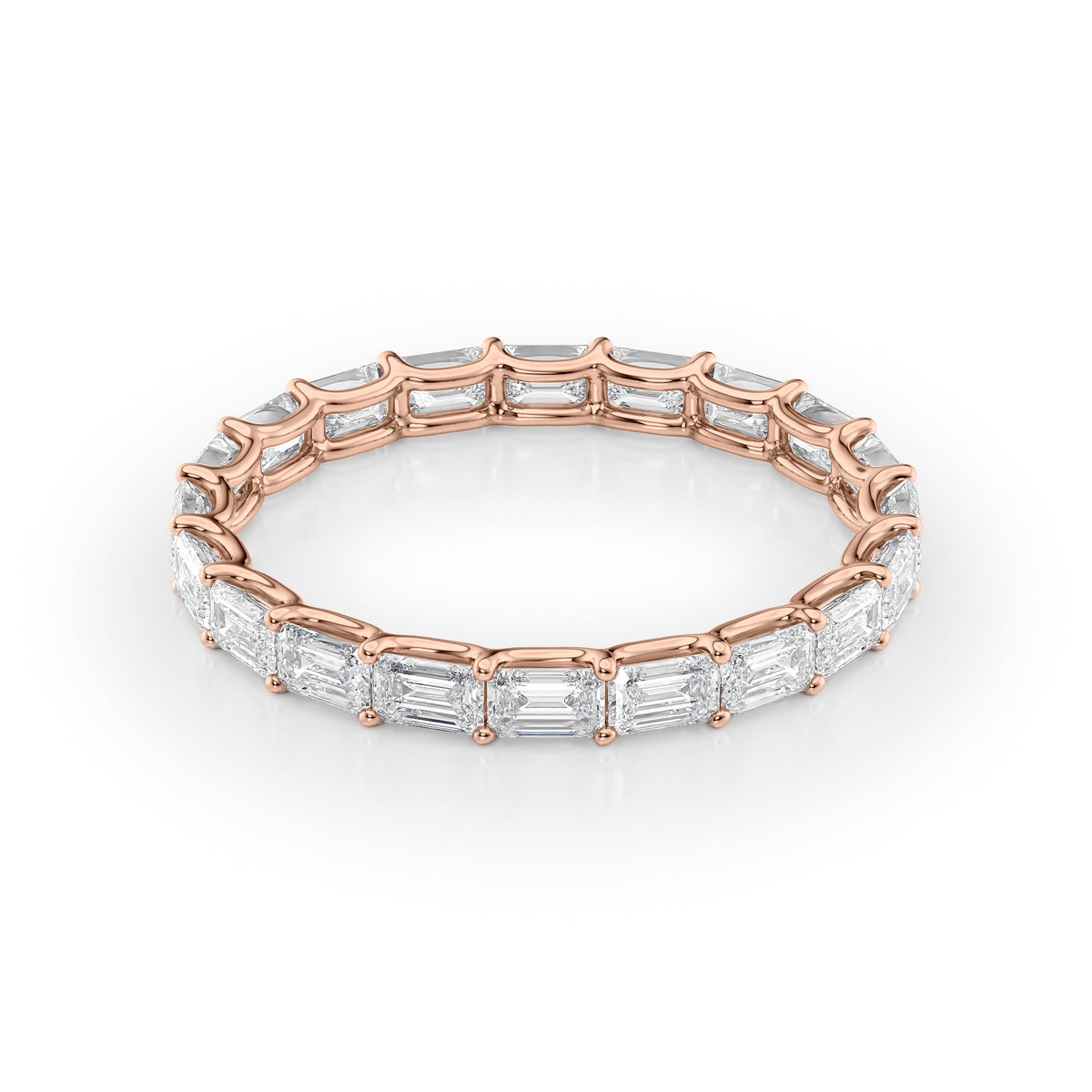 1ct Round Anniversary. A Rose Gold Anniversary Ring Set With 1tcw Round Lab Grown Diamonds. White Background.