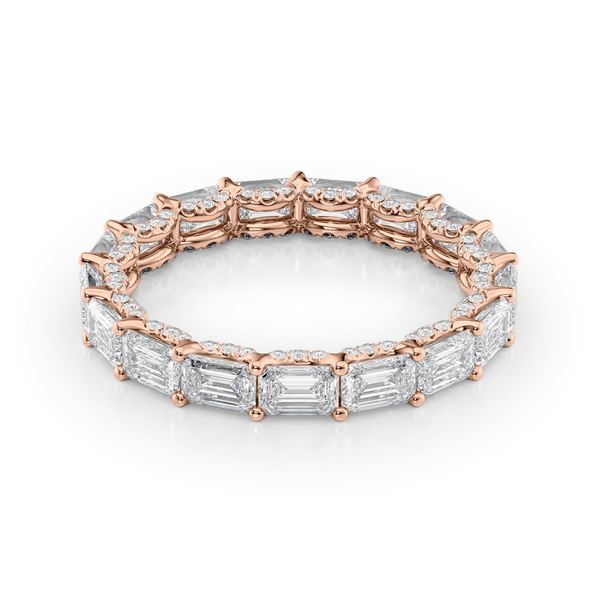 3.8ct East West Emerald U Pave Prong Eternity. A Rose Gold Eternity Ring Set With 3.5tcw Emerald Lab Grown Diamonds. White Background.