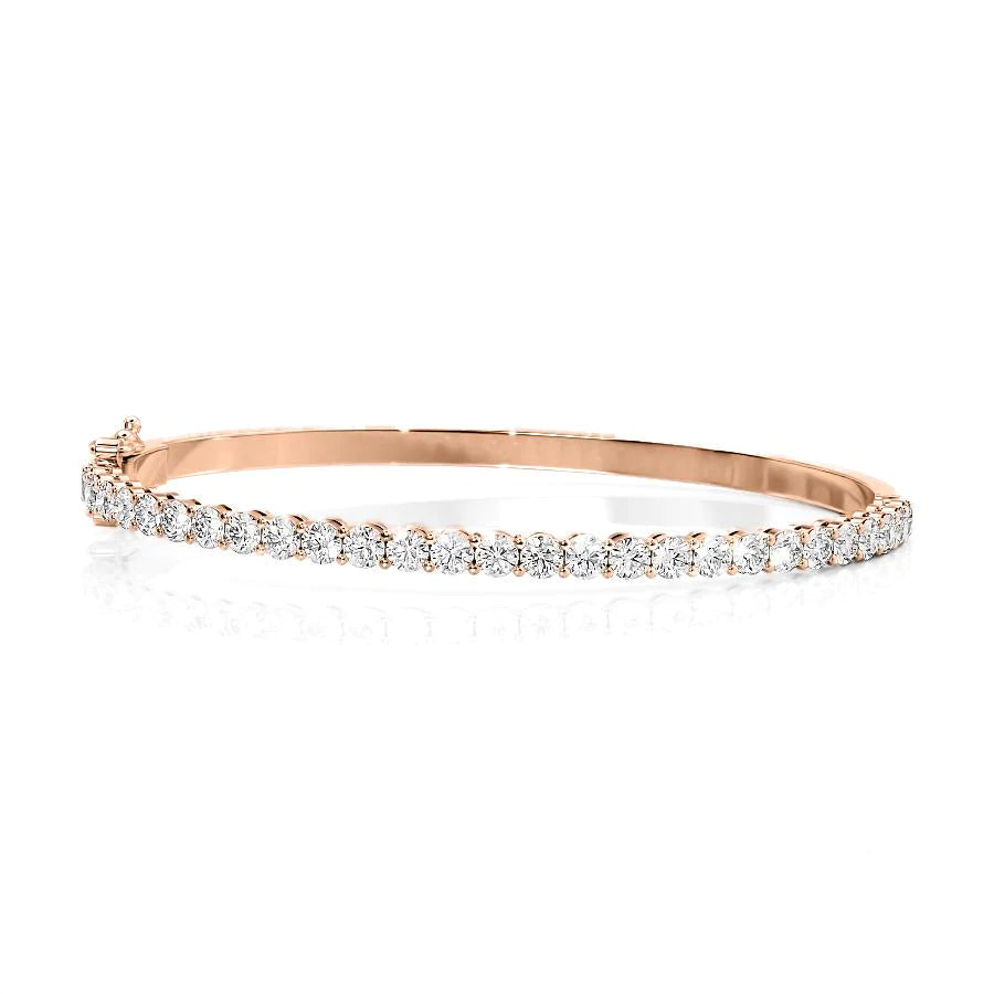 3ct Eternity Bangle. A Rose Gold Bangle Bracelet Set With 3tcw Round Lab Grown Diamonds. White Background.