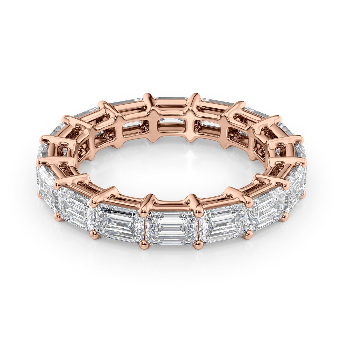 4.5ct East West Emerald Eternity. A Rose Gold Eternity Ring Set With 4.5tcw Emerald Lab Grown Diamonds. White Background.