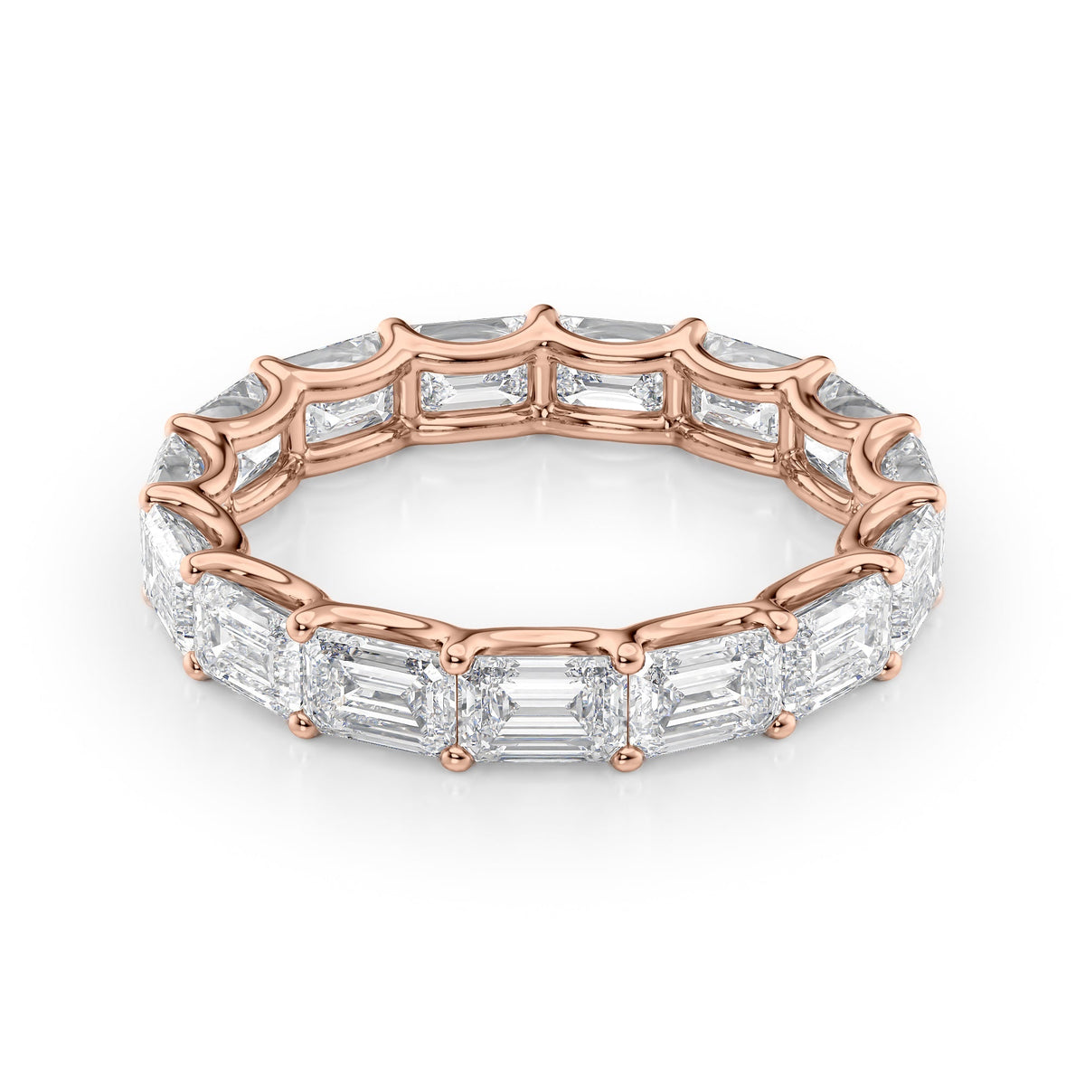 4.5ct East West Emerald U Prong Eternity. A Rose Gold Eternity Ring Set With 4.5tcw Emerald Lab Grown Diamonds. White Background.