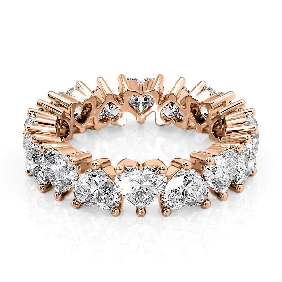 5.5ct Heart Eternity. A Rose Gold Eternity Ring Set With 5.5tcw Heart Lab Grown Diamonds. White Background.
