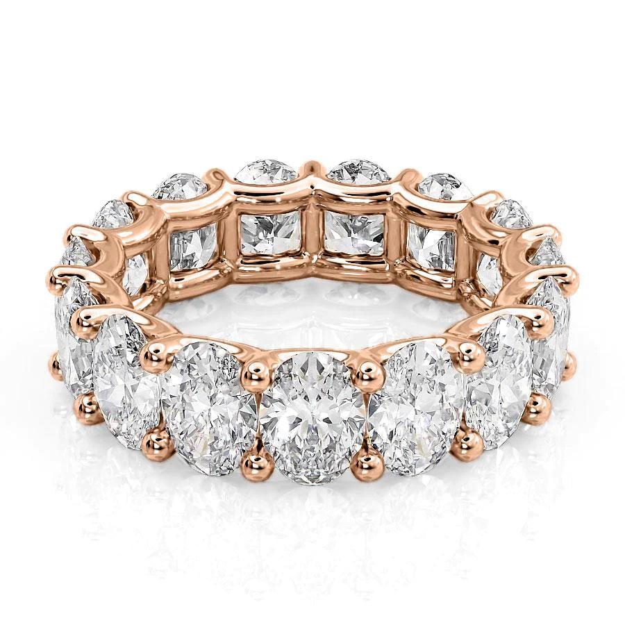 7.5ct Oval U Prong Eternity. A Rose Gold Eternity Ring Set With 7.5tcw Oval Lab Grown Diamonds. White Background.