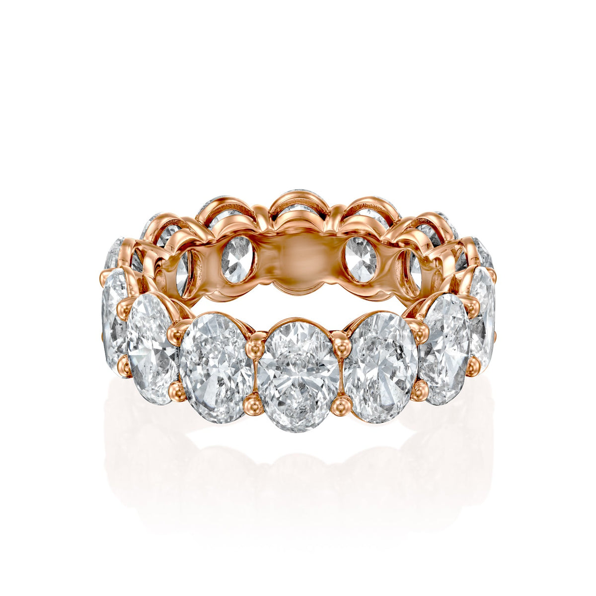 7ct Oval Eternity. A Rose Gold Eternity Ring Set With 7tcw Oval Lab Grown Diamonds. White Background.