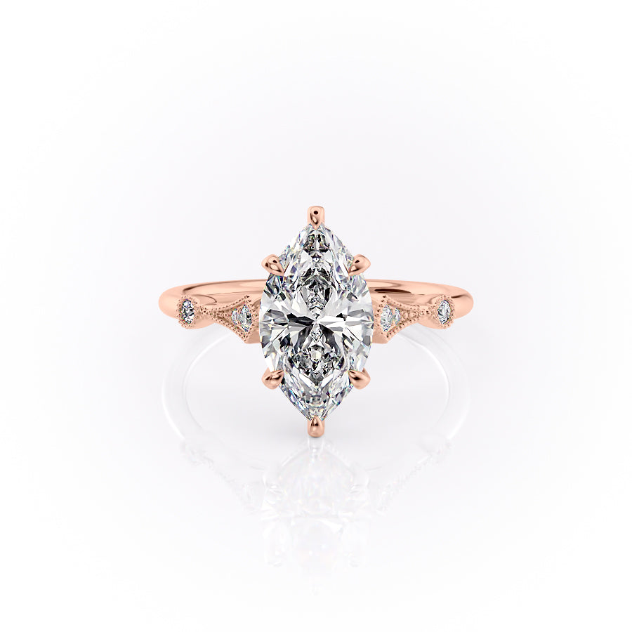 The Amber. A Rose Gold Vintage, Side Stones Engagement Ring Set With A 2ct Marquise Lab Grown Diamond. White Background.