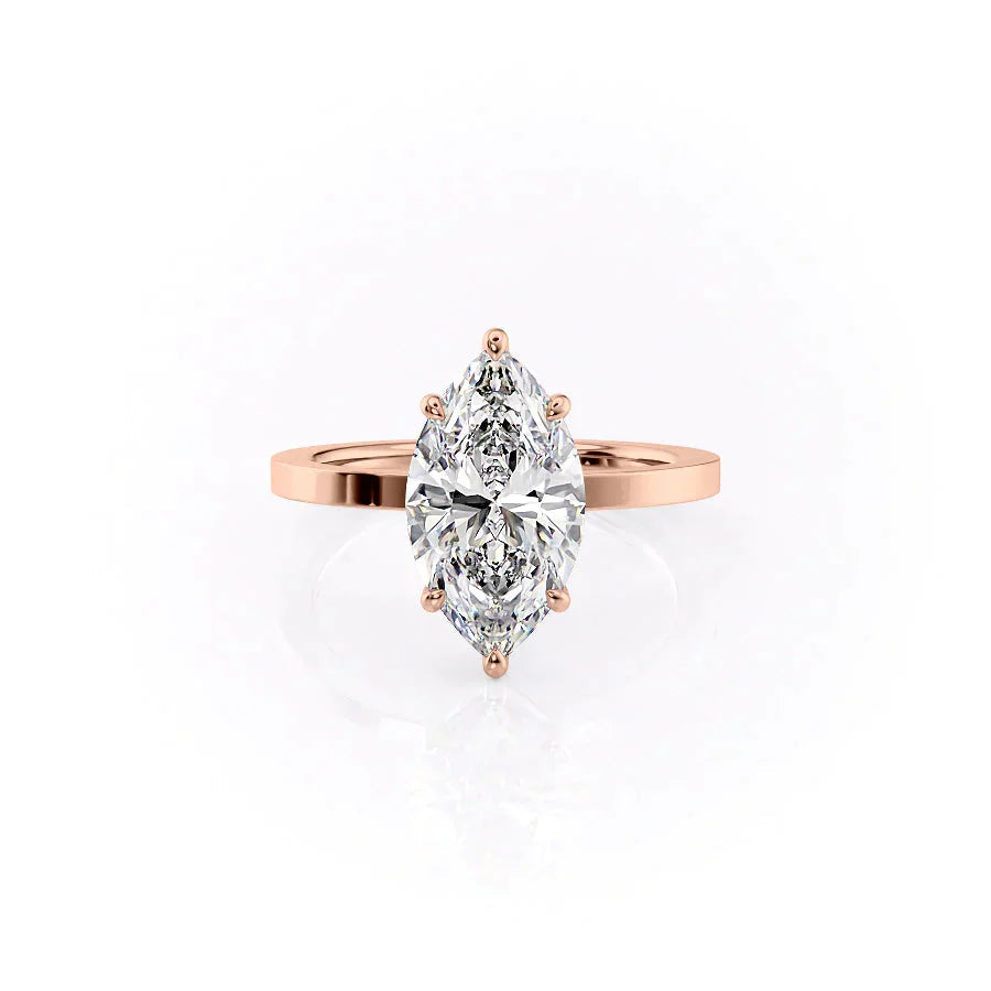 The Eleanor. A Rose Gold Solitaire Engagement Ring Set With A 2ct Marquise Lab Grown Diamond. White Background.