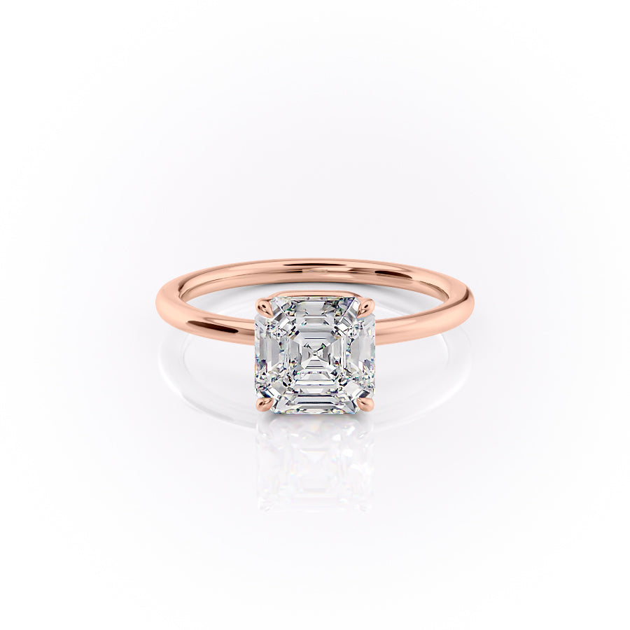 The Margot. A Rose Gold Solitaire, Hidden Halo Engagement Ring Set With A 2ct Asscher Lab Grown Diamond. White Background.