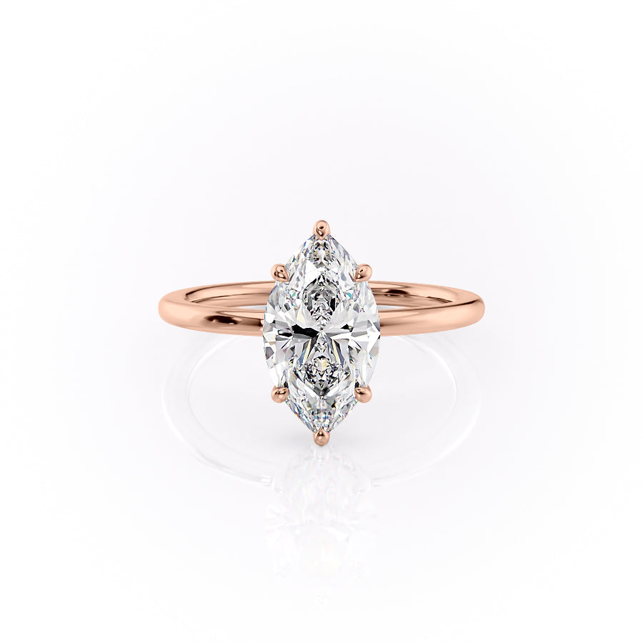 The Margot. A Rose Gold Solitaire, Hidden Halo Engagement Ring Set With A 2ct Marquise Lab Grown Diamond. White Background.