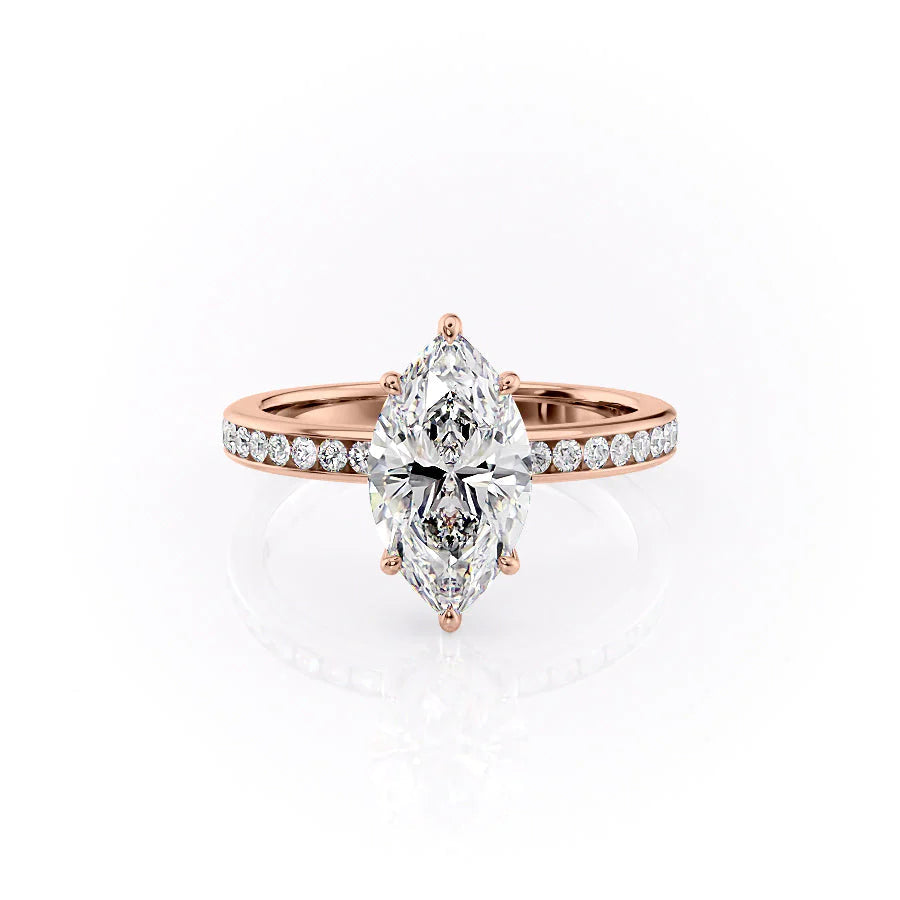 The Marilyn. A Rose Gold Channel-Set, Side Stones, Hidden Halo Engagement Ring Set With A 2ct Marquise Lab Grown Diamond. White Background.