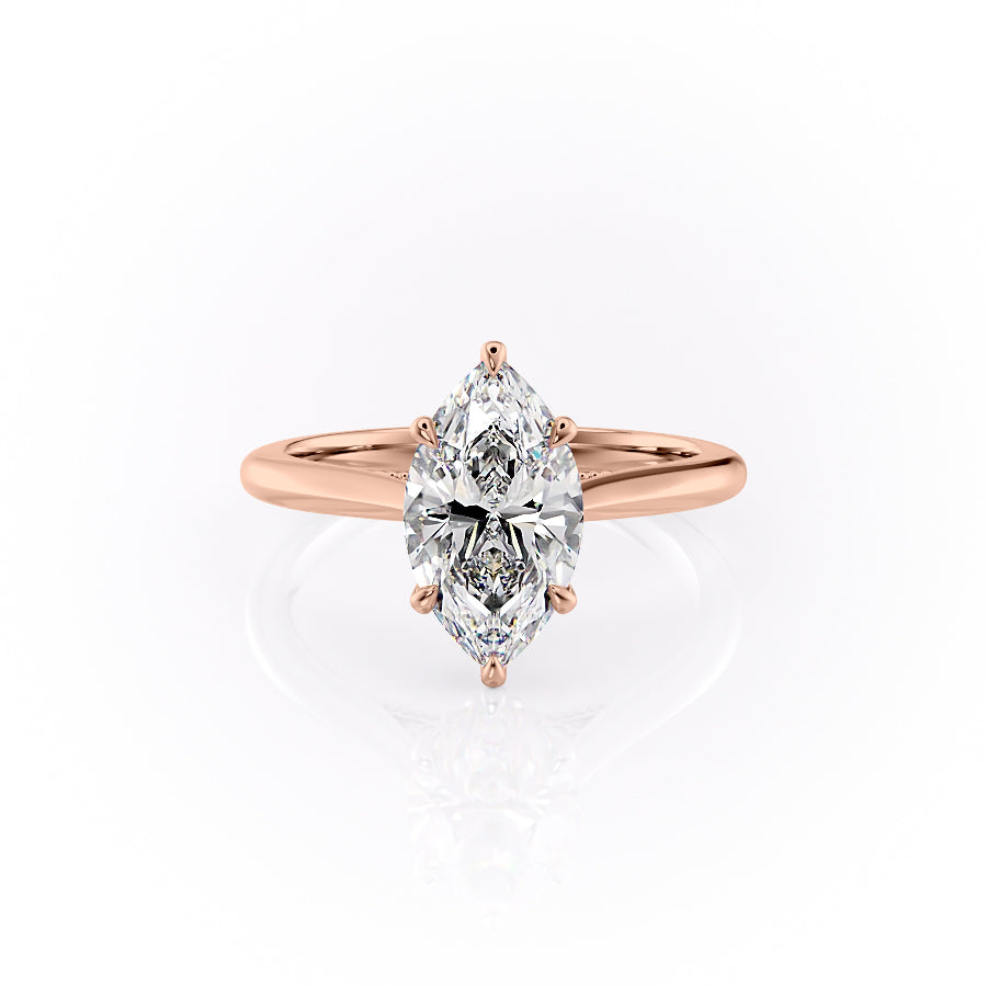 The Miranda. A Rose Gold Vintage, Solitaire Engagement Ring Set With A 2ct Marquise Lab Grown Diamond. White Background.