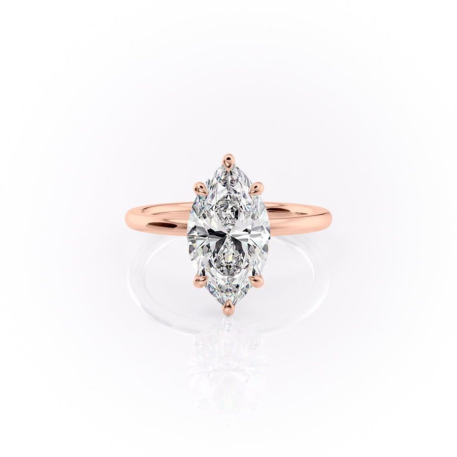 The Nelly. A Rose Gold Solitaire, Hidden Halo Engagement Ring Set With A 2ct Marquise Lab Grown Diamond. White Background.