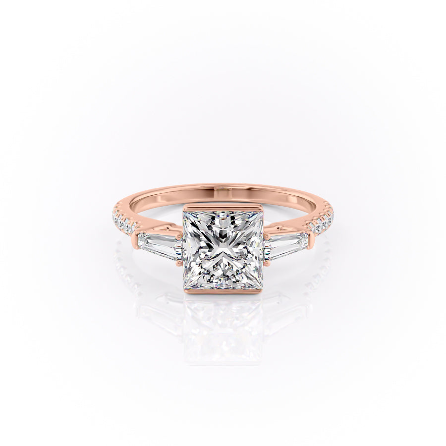 The Pave Parker. A Rose Gold Three Stone, Bezel Engagement Ring Set With A 2ct Princess Lab Grown Diamond. White Background.