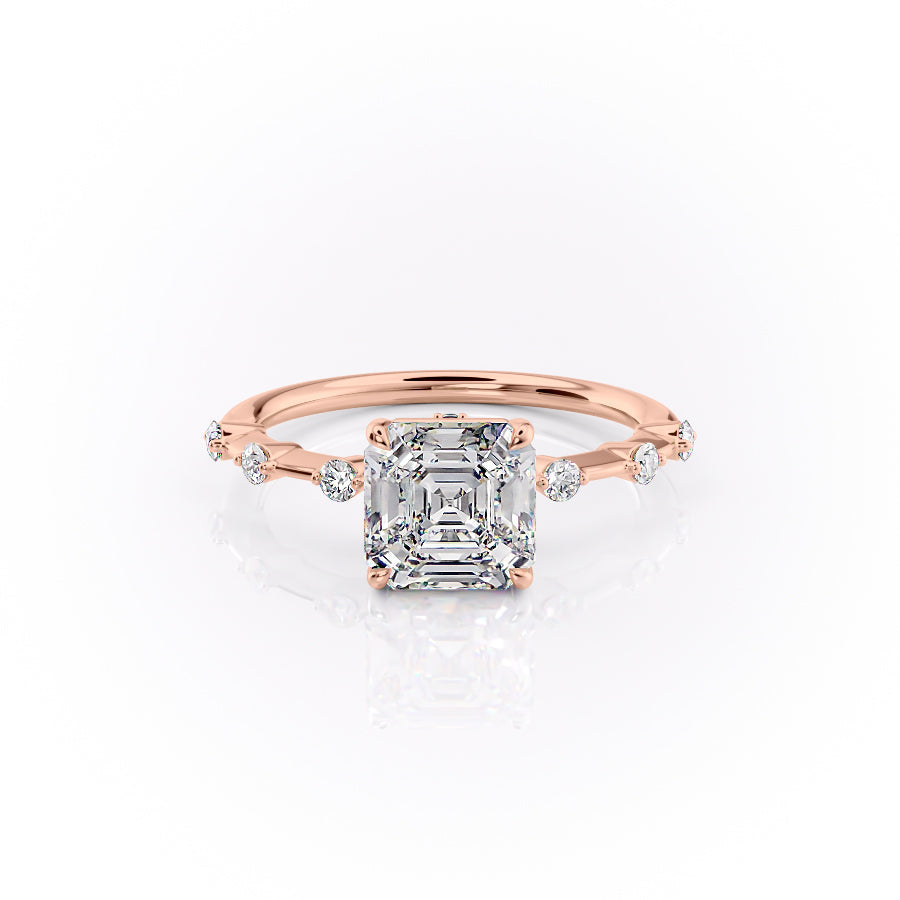 The Penelope. A Rose Gold Solitaire, Side Stones Engagement Ring Set With A 2ct Asscher Lab Grown Diamond. White Background.
