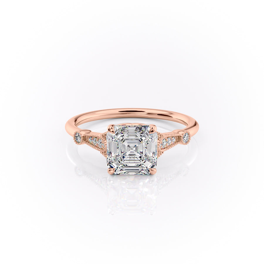 The Stephanie. A Rose Gold Vintage, Side Stones Engagement Ring Set With A 2ct Asscher Lab Grown Diamond. White Background.