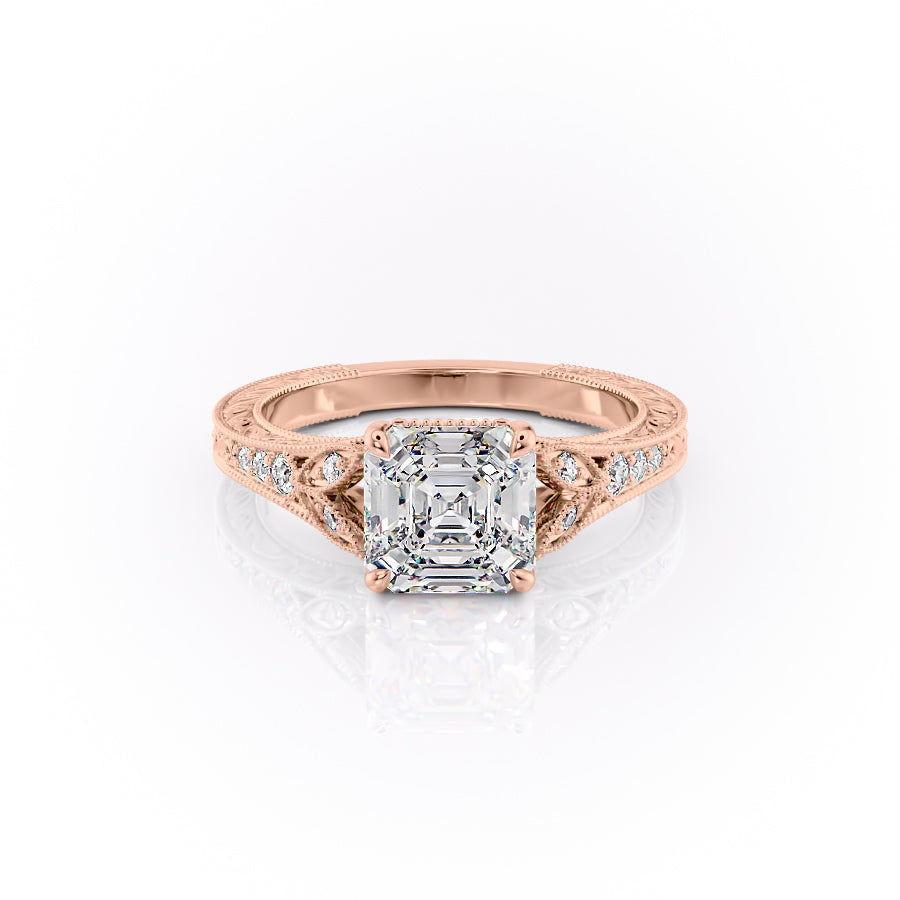 The Violet. A Rose Gold Vintage, Side Stones Engagement Ring Set With A 2ct Asscher Lab Grown Diamond. White Background.