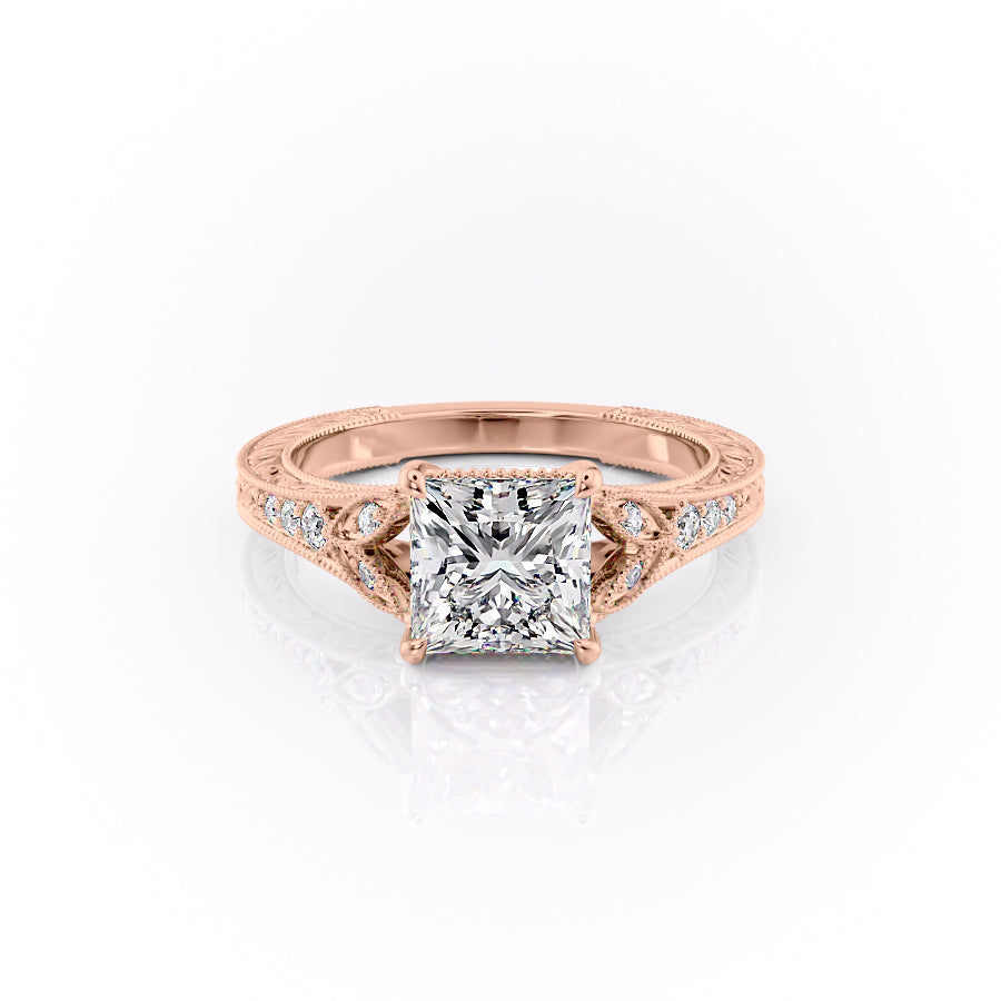 The Violet. A Rose Gold Vintage, Side Stones Engagement Ring Set With A 2ct Princess Lab Grown Diamond. White Background.