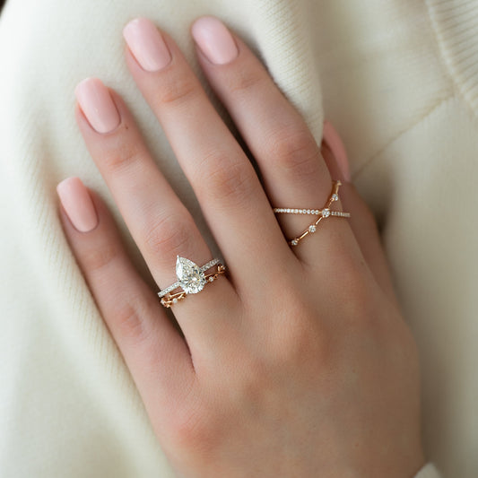 What is the best wedding band for a pear shaped engagement ring?