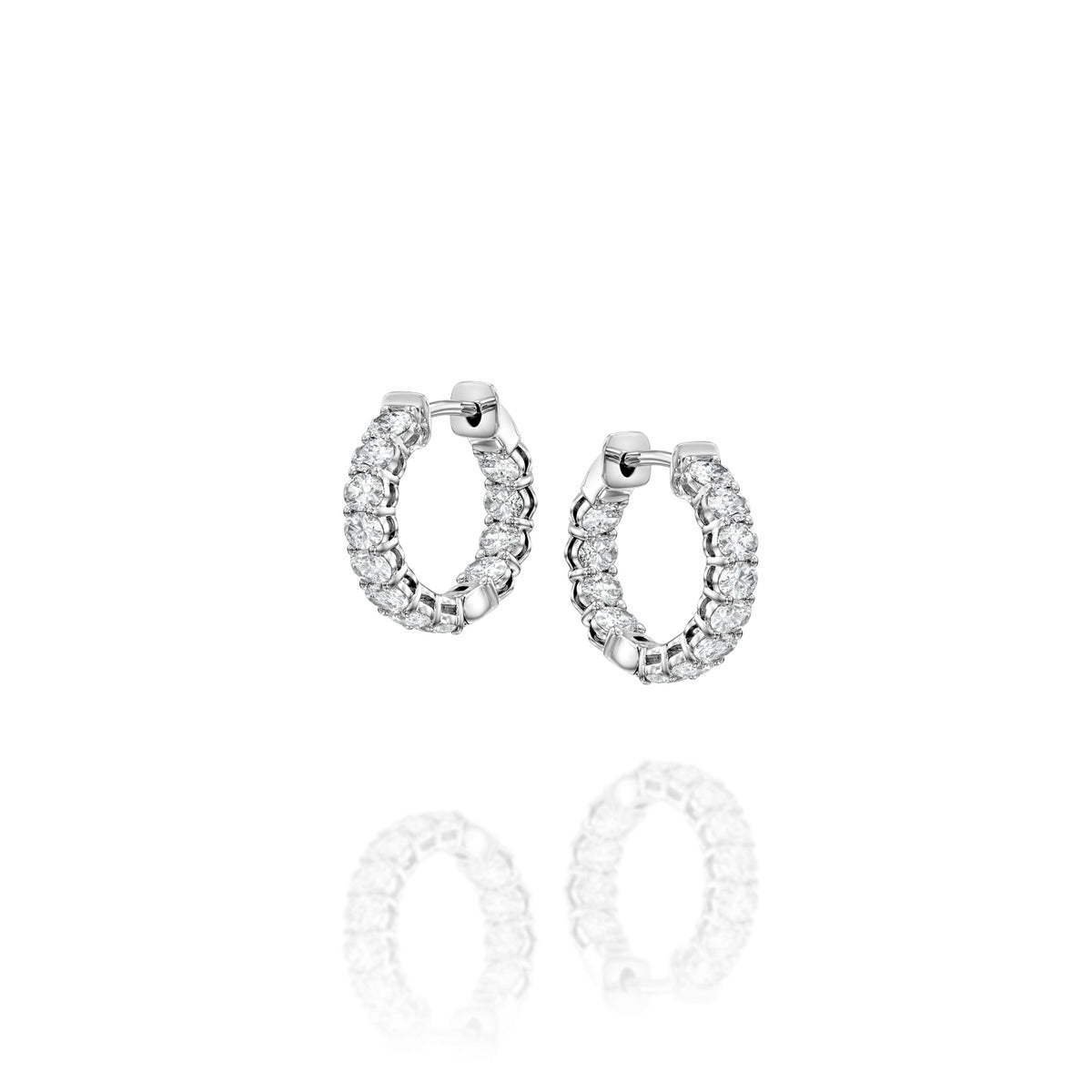 1.5ct 15mm East West Oval Eternity Hoops. A White Gold Hoop Earrings Set With 1.5tcw Oval Lab Grown Diamonds. White Background.
