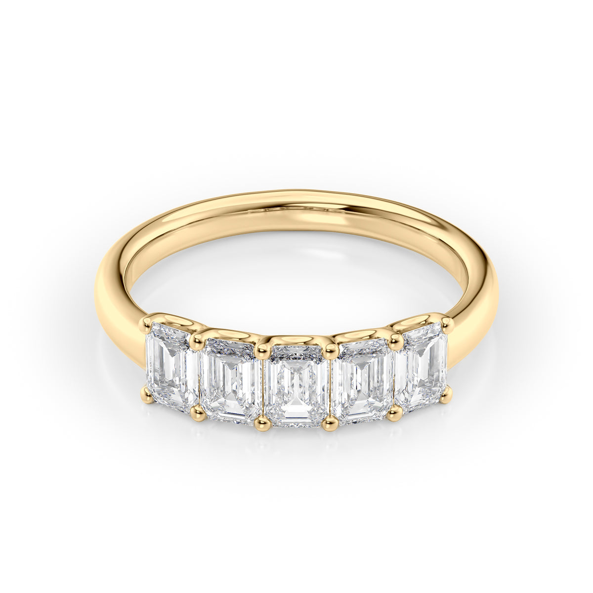 1.5ct Emerald U Prong Anniversary. A Yellow Gold Anniversary Ring Set With 1.5tcw Emerald Lab Grown Diamonds. White Background.