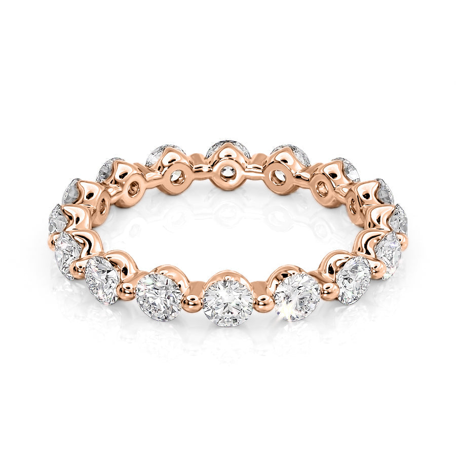 1.5ct Round Shared Prong Eternity. A Rose Gold Eternity Ring Set With 1.5tcw Round Lab Grown Diamonds. White Background.