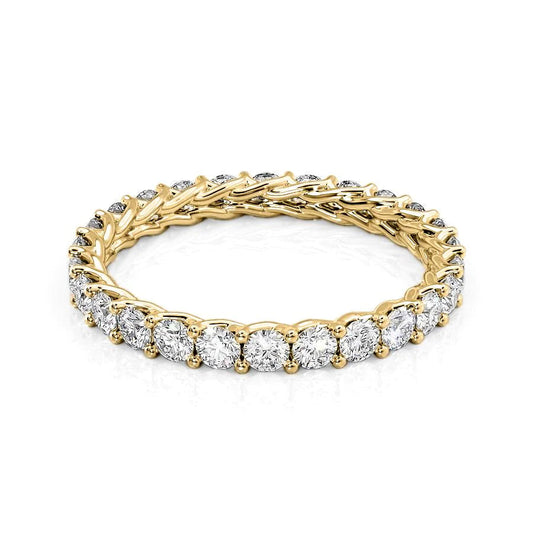 1.5ct Round Trellis Eternity. A Yellow Gold Eternity Ring Set With 1.5tcw Round Lab Grown Diamonds. White Background.