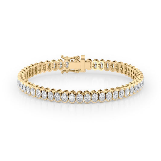 10ct Bezel Oval Tennis Bracelet. A Yellow Gold Tennis Bracelet Set With 10tcw Oval Lab Grown Diamonds. White Background.
