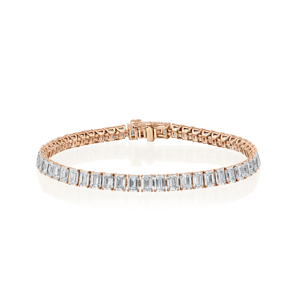 10ct Emerald Tennis Bracelet. A Rose Gold Tennis Bracelet Set With 10tcw Emerald Lab Grown Diamonds. White Background.