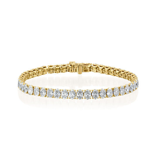 15ct Oval Tennis Bracelet. A Yellow Gold Tennis Bracelet Set With 15tcw Oval Lab Grown Diamonds. White Background.