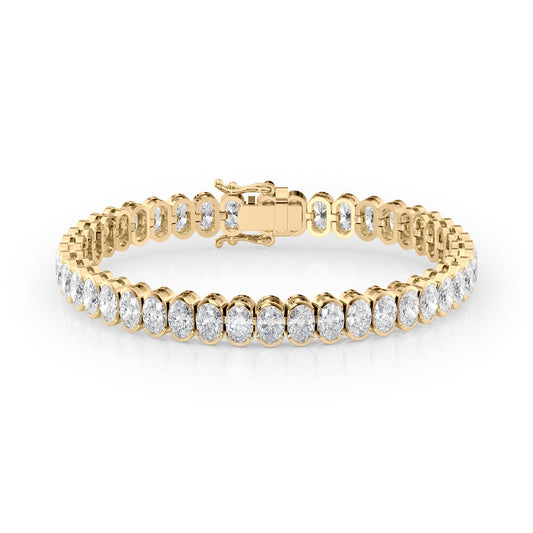 16ct Bezel Oval Tennis Bracelet. A Yellow Gold Tennis Bracelet Set With 16tcw Oval Lab Grown Diamonds. White Background.