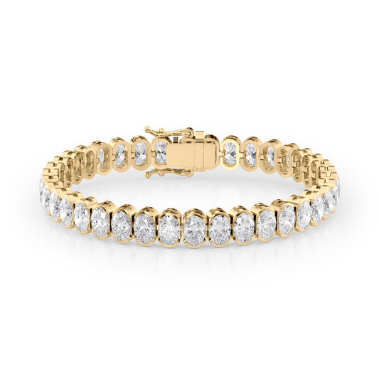 18ct Bezel Oval Tennis Bracelet. A Yellow Gold Tennis Bracelet Set With 18tcw Oval Lab Grown Diamonds. White Background.