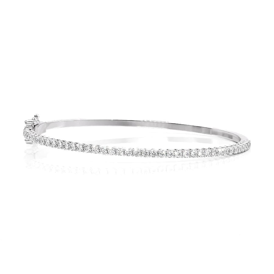 1ct Eternity Bangle. A White Gold Bangle Bracelet Set With 1tcw Round Lab Grown Diamonds. White Background.
