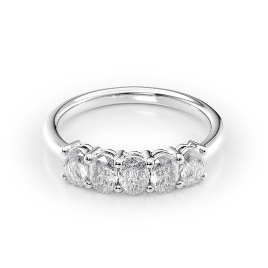 1ct Oval Anniversary. A White Gold Anniversary Ring Set With 1tcw Oval Lab Grown Diamonds. White Background.