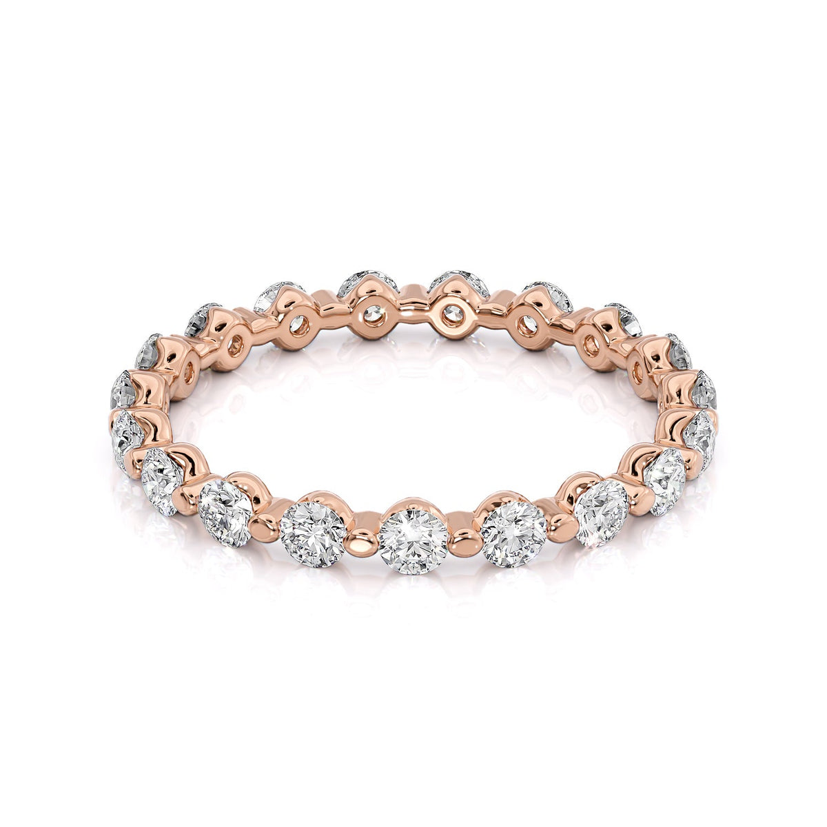 1ct Round Shared Prong Eternity. A Rose Gold Eternity Ring Set With 1tcw Round Lab Grown Diamonds. White Background.