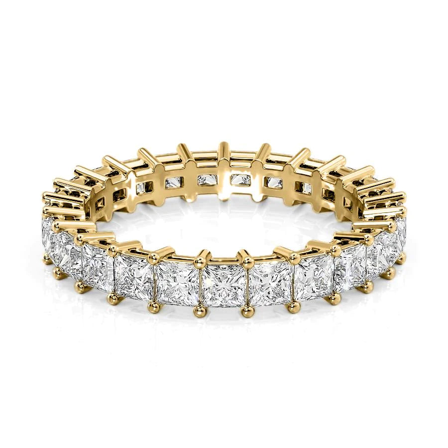 2.5ct Princess Eternity. A Yellow Gold Eternity Ring Set With 2.5tcw Princess Lab Grown Diamonds. White Background.