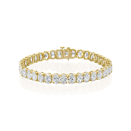 20ct Oval Tennis Bracelet. A Yellow Gold Tennis Bracelet Set With 20tcw Oval Lab Grown Diamonds. White Background.