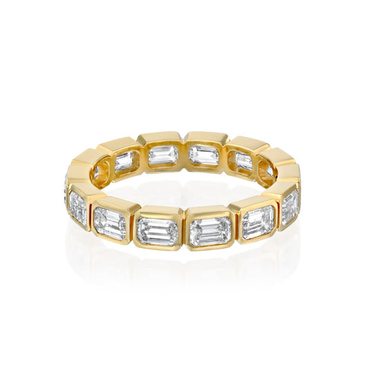 2ct East West Emerald Bezel Eternity. A Yellow Gold Eternity Ring Set With 2tcw Emerald Lab Grown Diamonds. White Background.