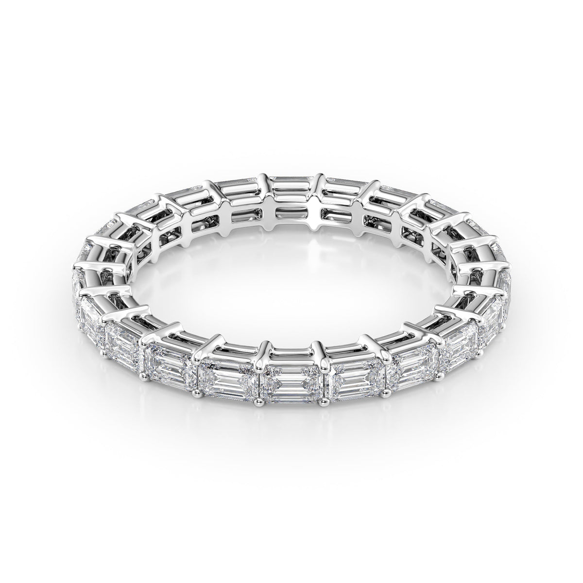 2ct East West Emerald Eternity. A White Gold Eternity Ring Set With 2tcw Emerald Lab Grown Diamonds. White Background.