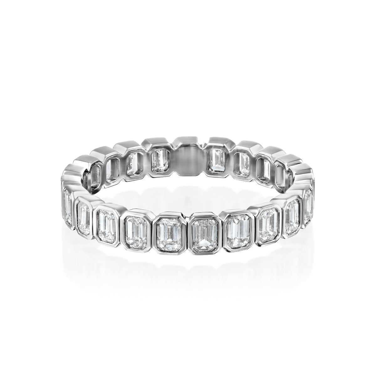 2ct Emerald Bezel Eternity. A White Gold Eternity Ring Set With 2tcw Emerald Lab Grown Diamonds. White Background.