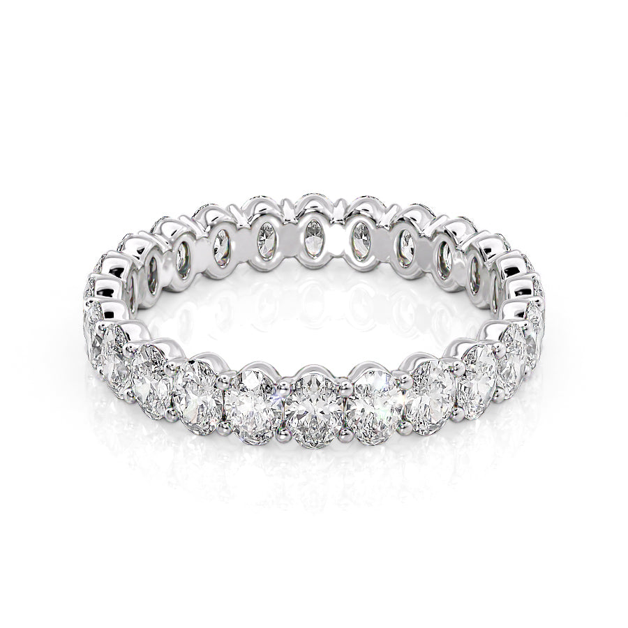 2ct Oval Eternity. A White Gold Eternity Ring Set With 2tcw Oval Lab Grown Diamonds. White Background.
