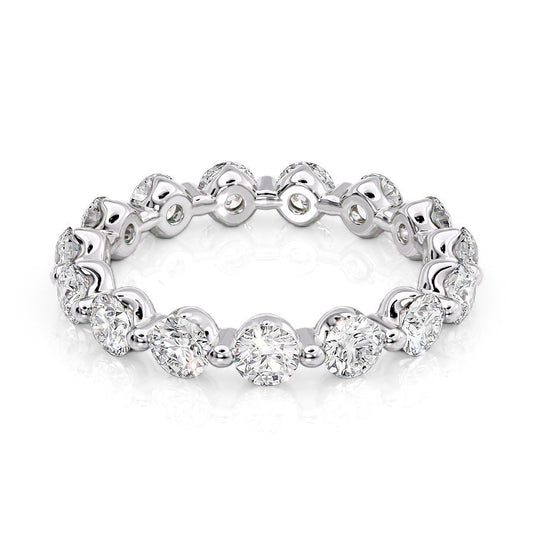 2ct Round Shared Prong Eternity. A White Gold Eternity Ring Set With 2tcw Round Lab Grown Diamonds. White Background.
