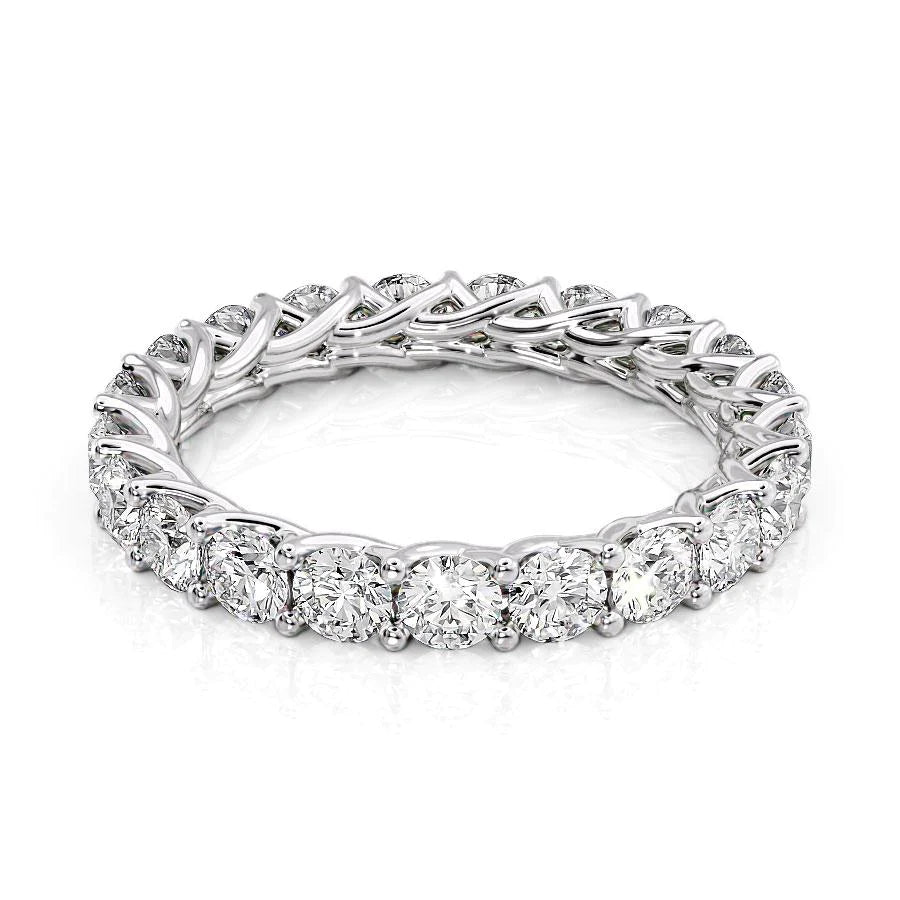 2ct Round Trellis Eternity. A White Gold Eternity Ring Set With 2tcw Round Lab Grown Diamonds. White Background.