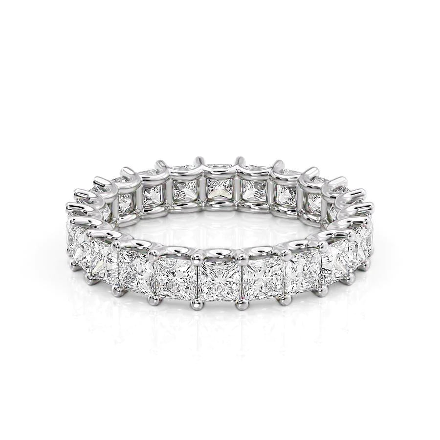 3.5ct Princess U Prong Eternity. A White Gold Eternity Ring Set With 3.5tcw Princess Lab Grown Diamonds. White Background.