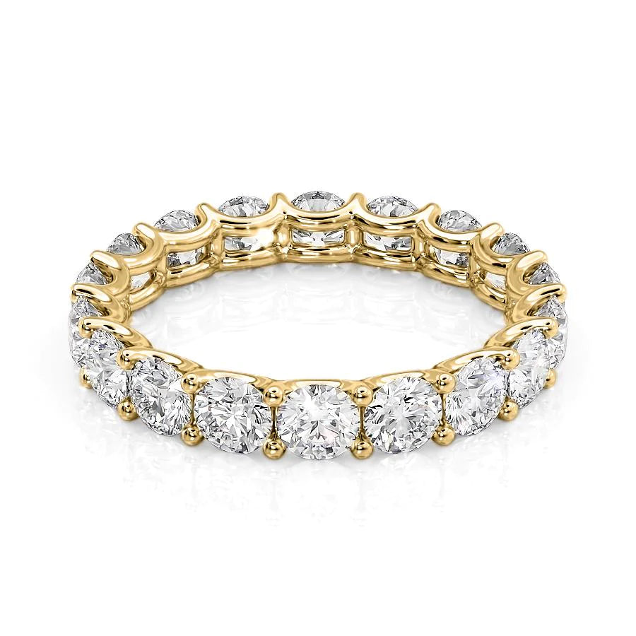 3.5ct Round U Prong Eternity. A Yellow Gold Eternity Ring Set With 3.5tcw Round Lab Grown Diamonds. White Background.
