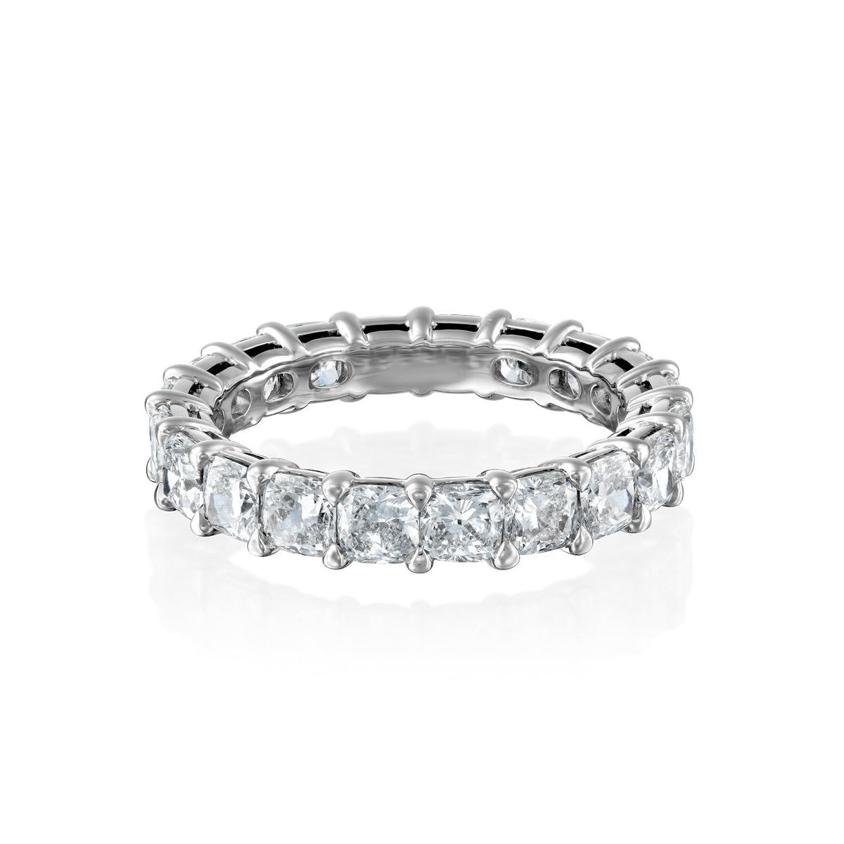 3ct Cushion Eternity. A White Gold Eternity Ring Set With 3tcw Cushion Lab Grown Diamonds. White Background.