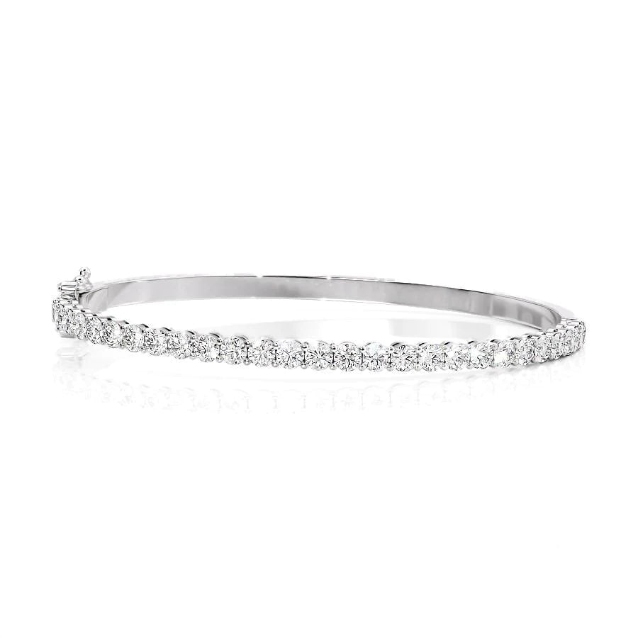 3ct Eternity Bangle. A White Gold Bangle Bracelet Set With 3tcw Round Lab Grown Diamonds. White Background.
