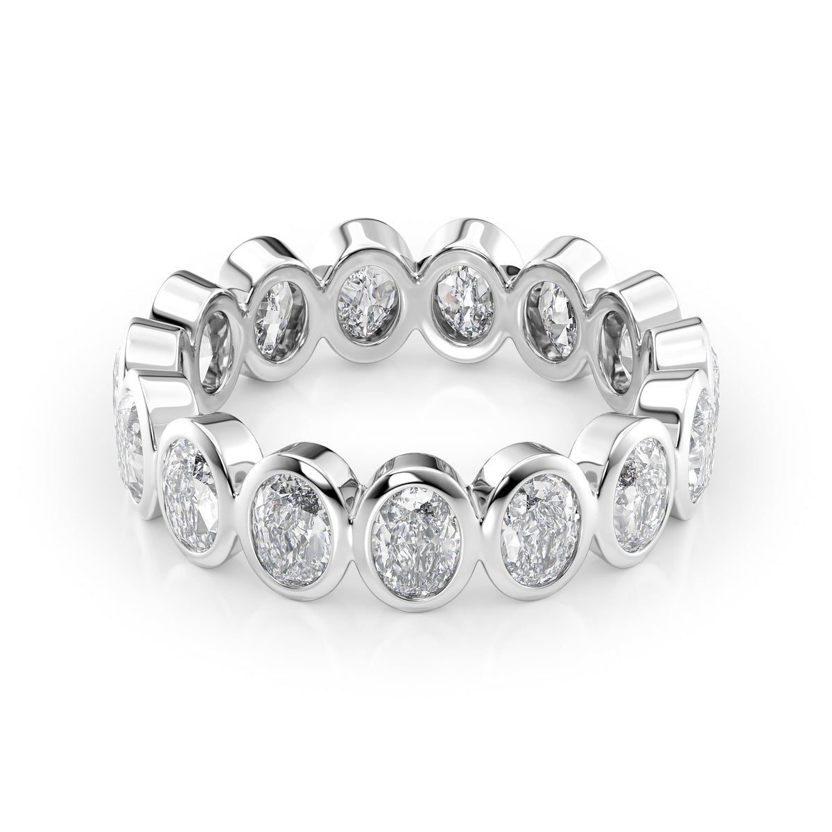 3ct Oval Bezel Eternity. A White Gold Eternity Ring Set With 3tcw Oval Lab Grown Diamonds. White Background.