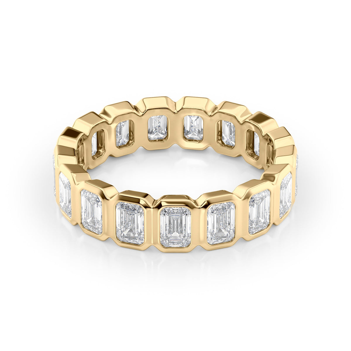 4.5ct Emerald Bezel Eternity. A Yellow Gold Eternity Ring Set With 4.5tcw Emerald Lab Grown Diamonds. White Background.