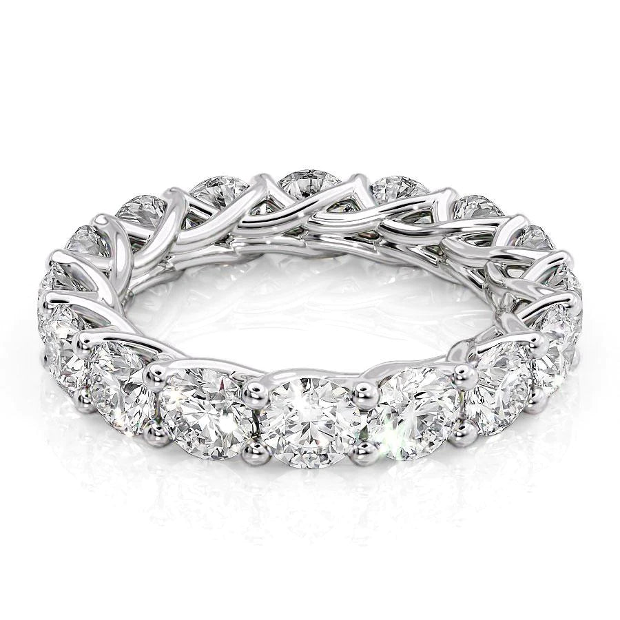 4.5ct Round Trellis Eternity. A White Gold Eternity Ring Set With 4.5tcw Round Lab Grown Diamonds. White Background.